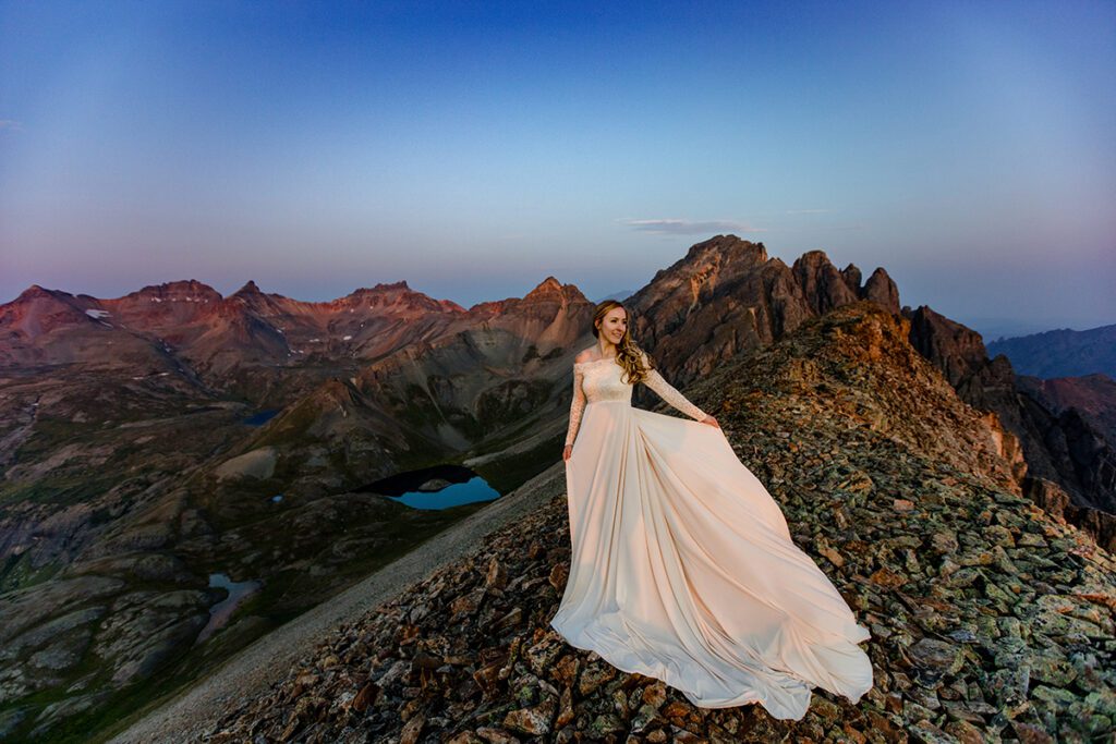 A bride above Island Lake in the San Juan mountains at Sunrise