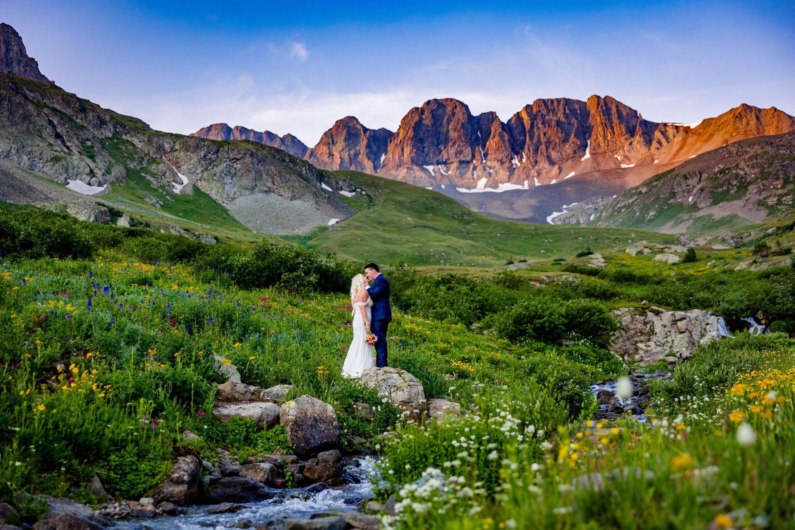 A bride and groom in American Basin near Lake City Colorado.
